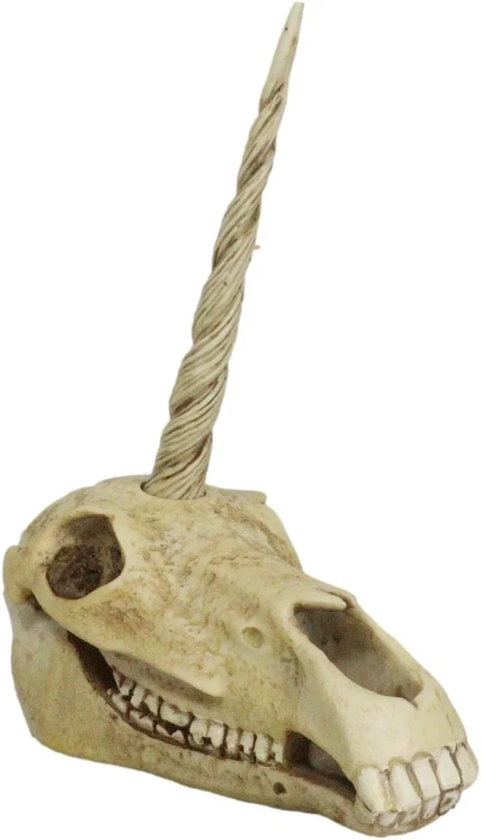 Resin fossil-cast unicorn skull sculpture, rendered as archaeological specimen