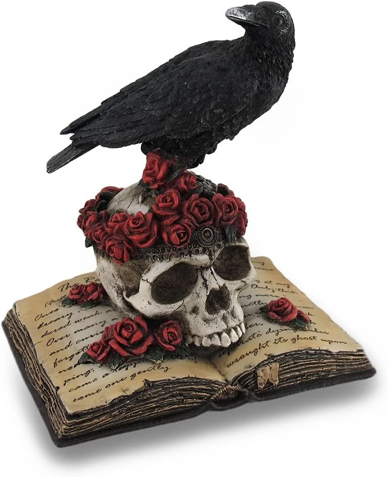 Hand-painted resin statue of a raven perched atop a rose-covered skull, mounted on The Raven poetry book, in gothic literary style